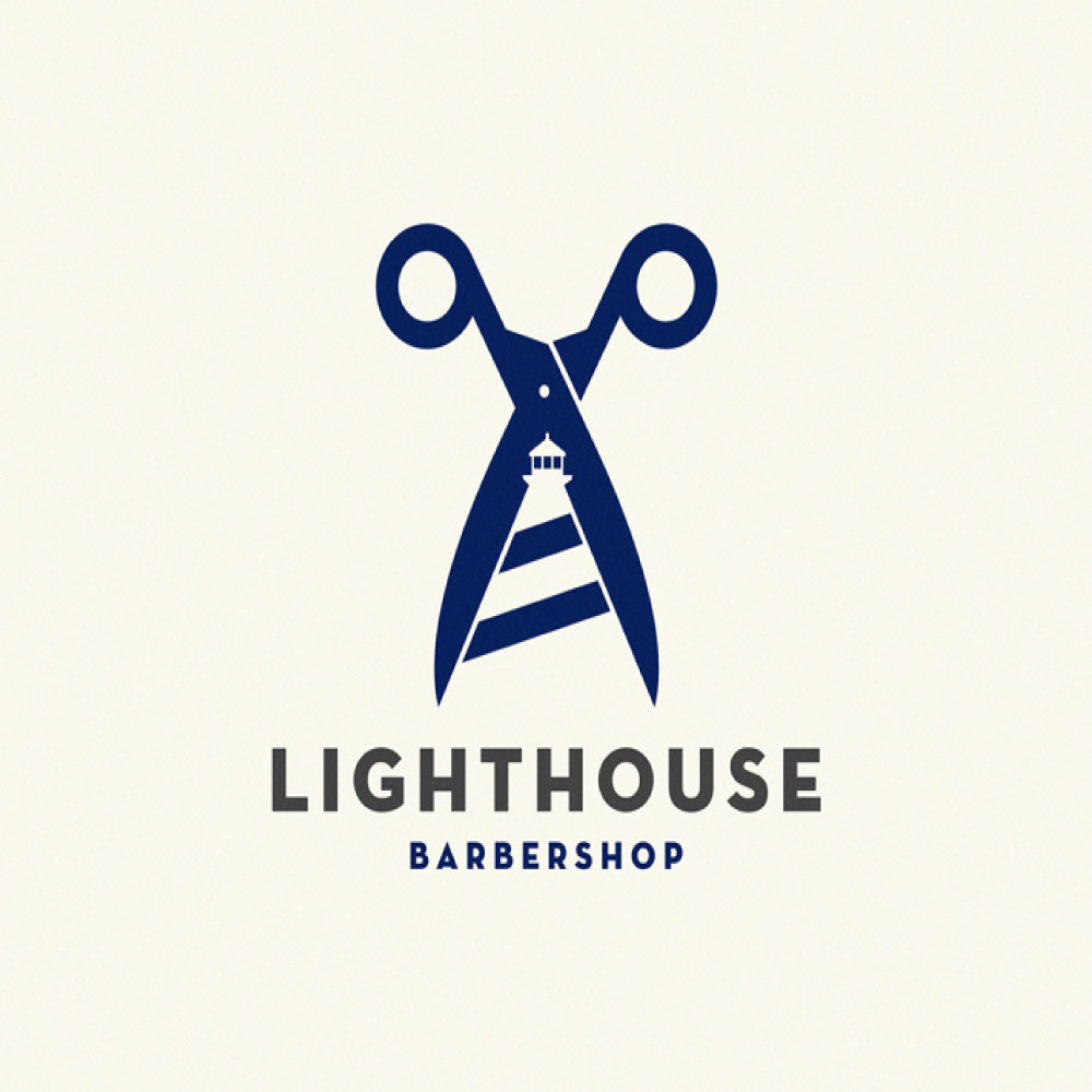 Negative space scissor logo with a lighthouse