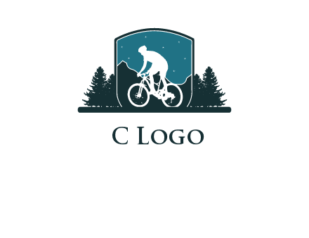 mountain biking in shield with trees emblem logo