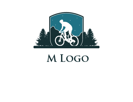 mountain biking in shield with trees emblem logo