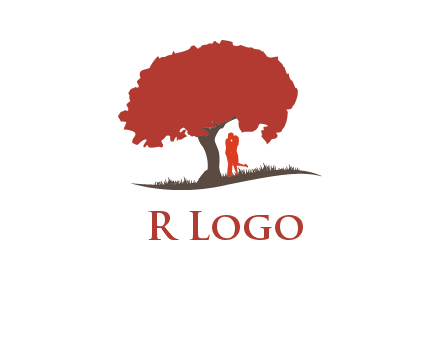 couple kissing under a tree logo